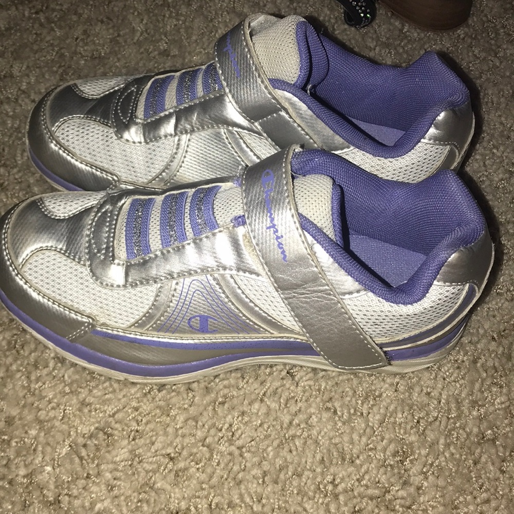 A pair of champion tennis shoes